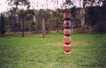 Terirem (left) and Praying Rope (right), hardwood. Photograph from a public group exhibition entitled Sculpture in the Vines, Hunter Valley Harvest Festival, New South Wales, Australia 2004.